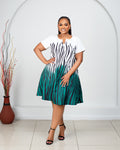 Beautiful white and green striped skater dress with gradient pattern and flared silhouette.