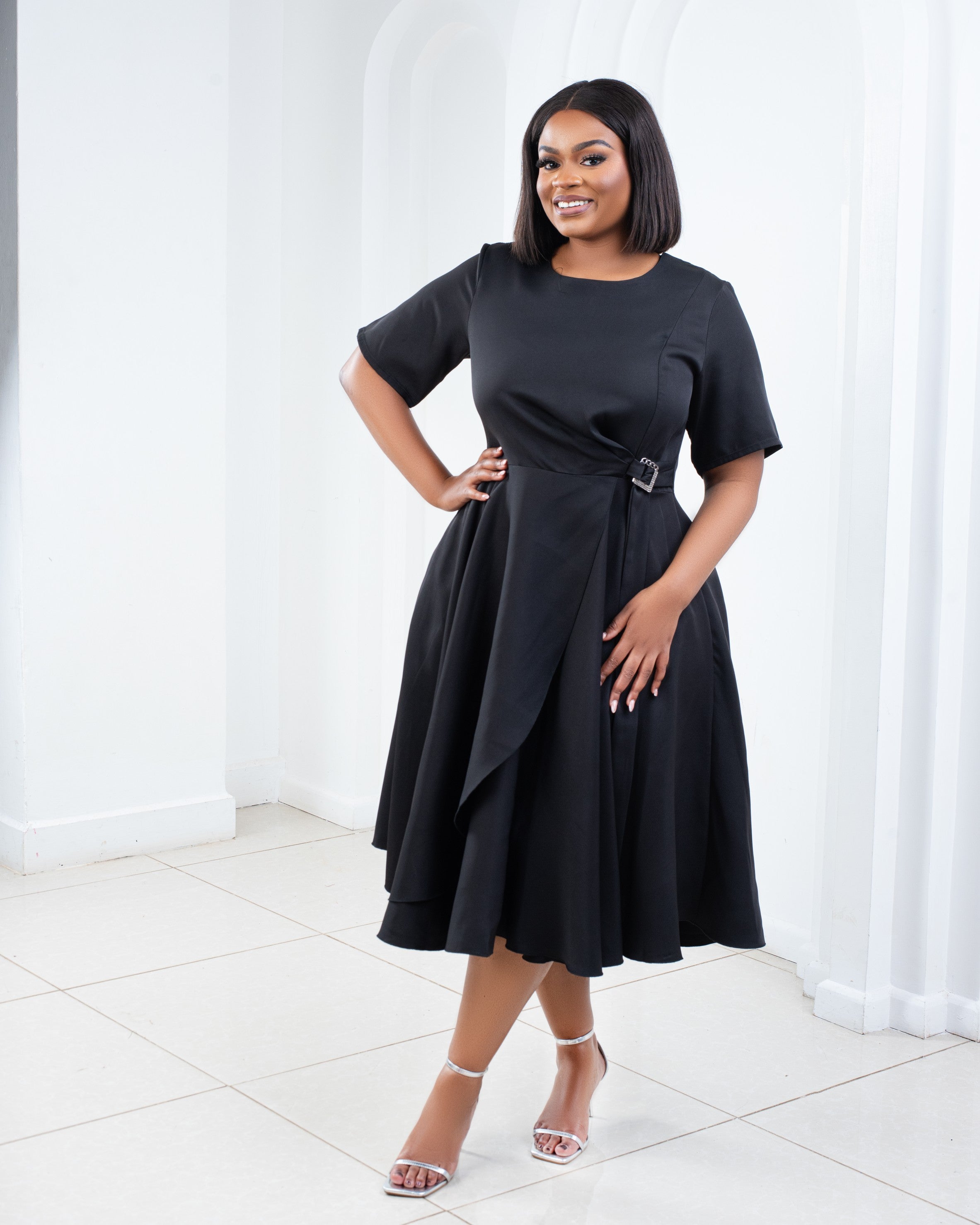 Black Midi Skater Dress with Wrap Skirt & Side Buckle – Elegant & Versatile